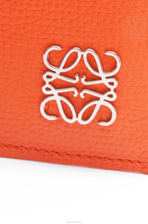 Loewe Anagram square cardholder in pebble grain calfskin with chain 688V1397 Women Orange